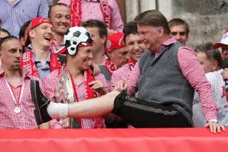 Louis van Gaal in traditional Bavarian costume at FC Bayern's championship celebrations in 2010